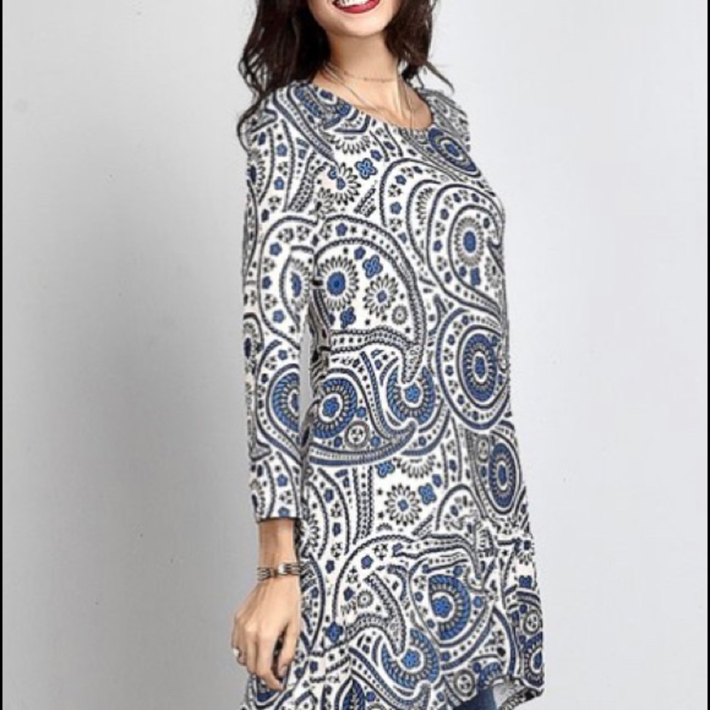 NWT.  Cute high low top.  Would pair great with leggings or skinny jeans.
